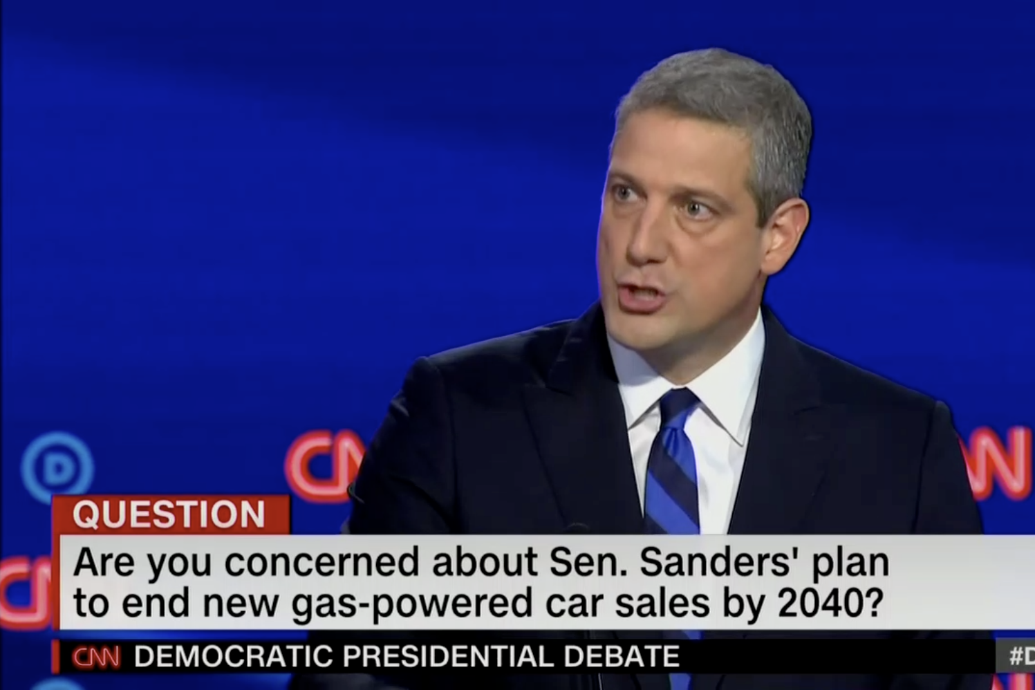 In this screengrab from CNN, the banner reads: "Are you concerned about Sen. Sanders' plan to end new gas-powered car sales by 2040?"