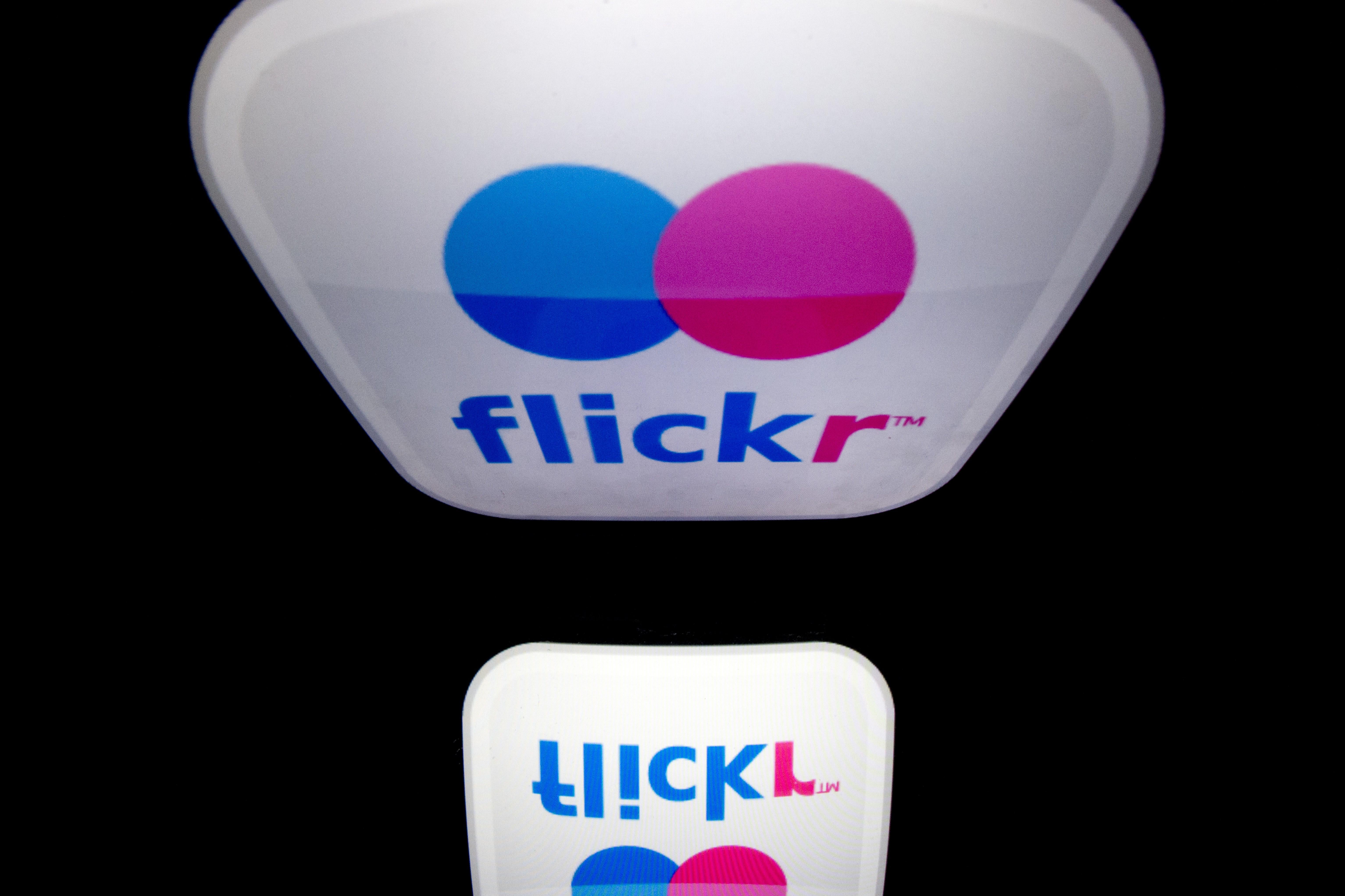 The logo of the Flickr website  is displayed on a tablet on January 2, 2014 in Paris.   AFP PHOTO / LIONEL BONAVENTURE        (Photo credit should read LIONEL BONAVENTURE/AFP/Getty Images)