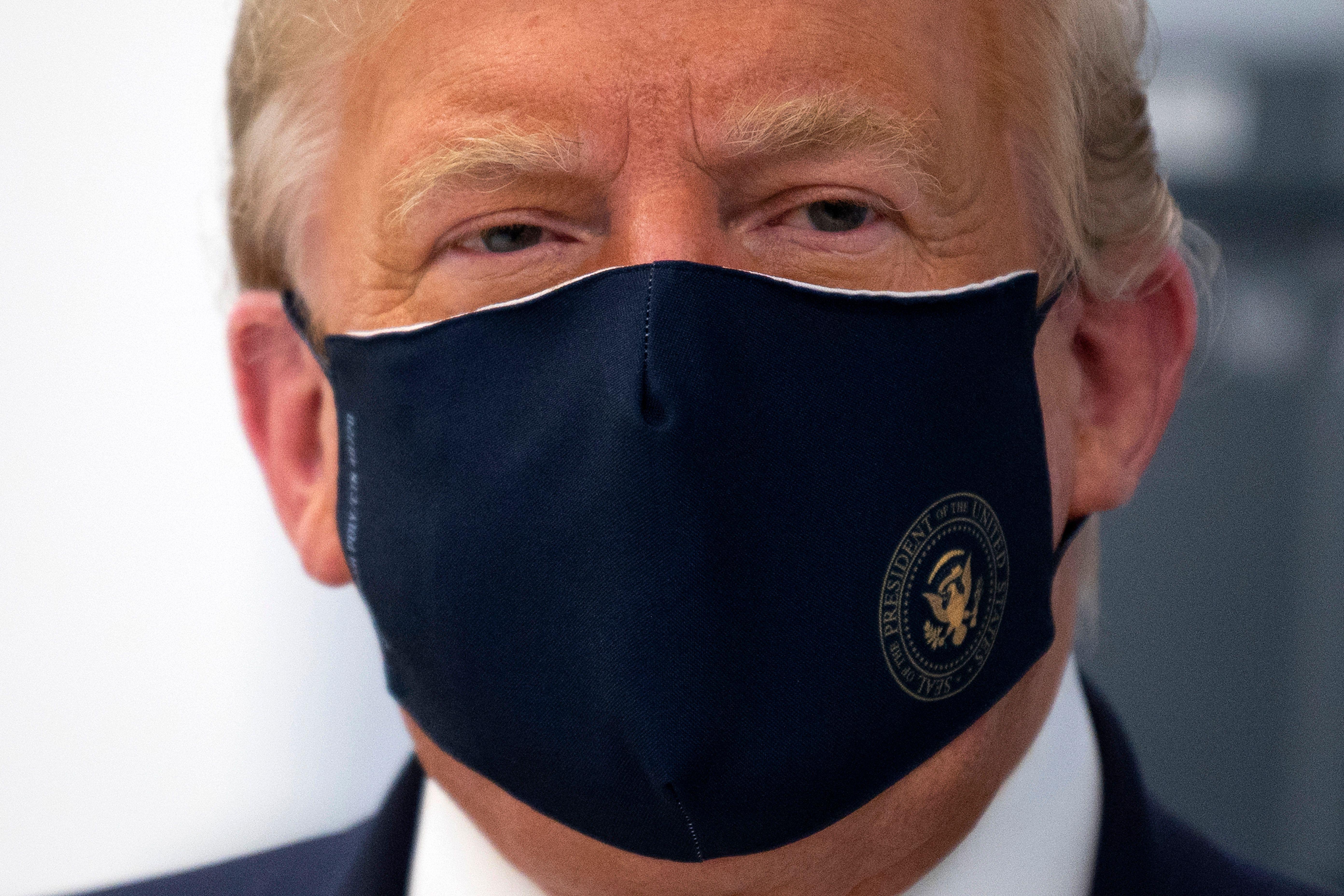 Donald Trump wearing a mask.