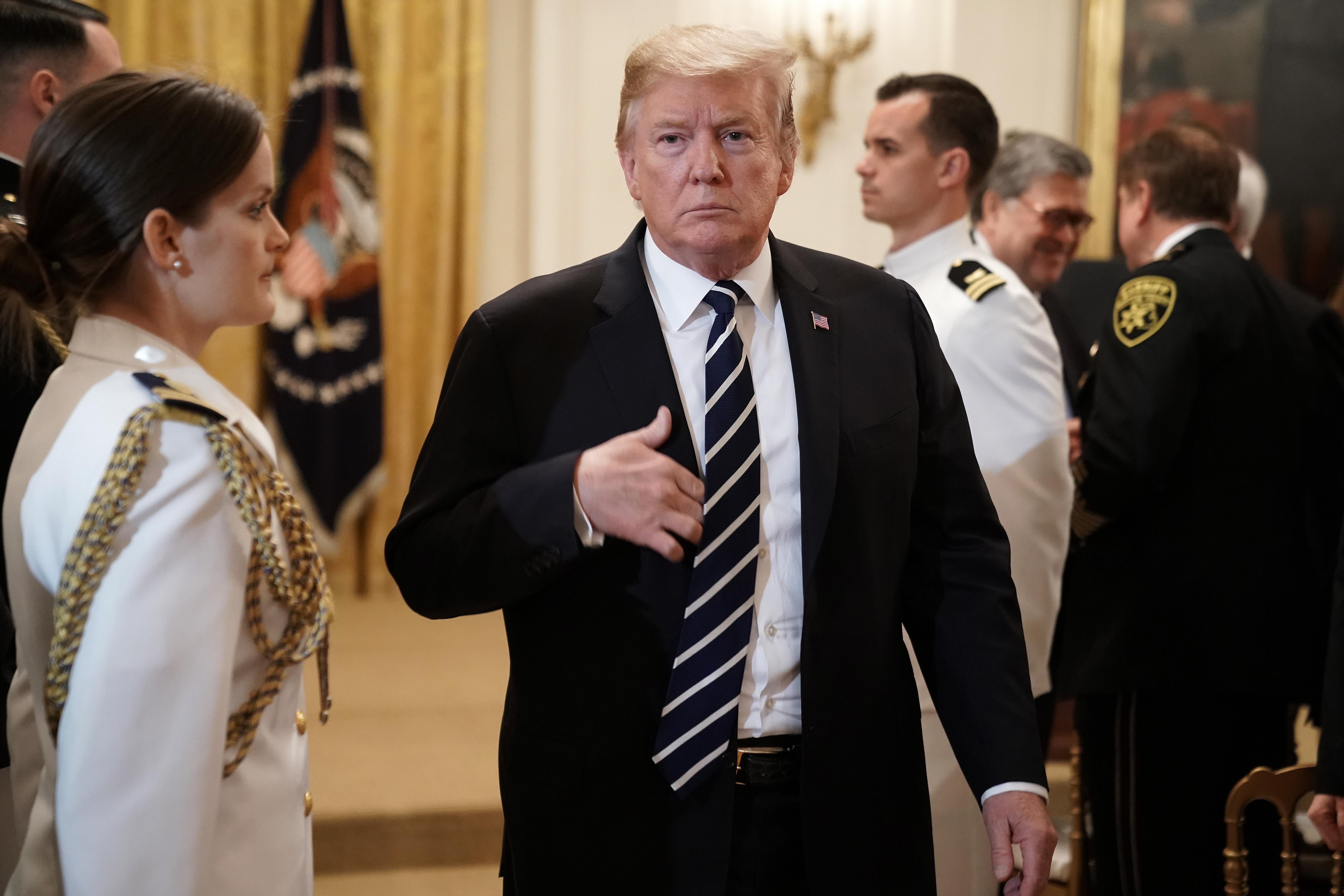 President Donald Trump walks off the podium after presenting the Public Safety Officer Medal of Valor at the White House on May 22, 2019 in Washington, D.C. 
