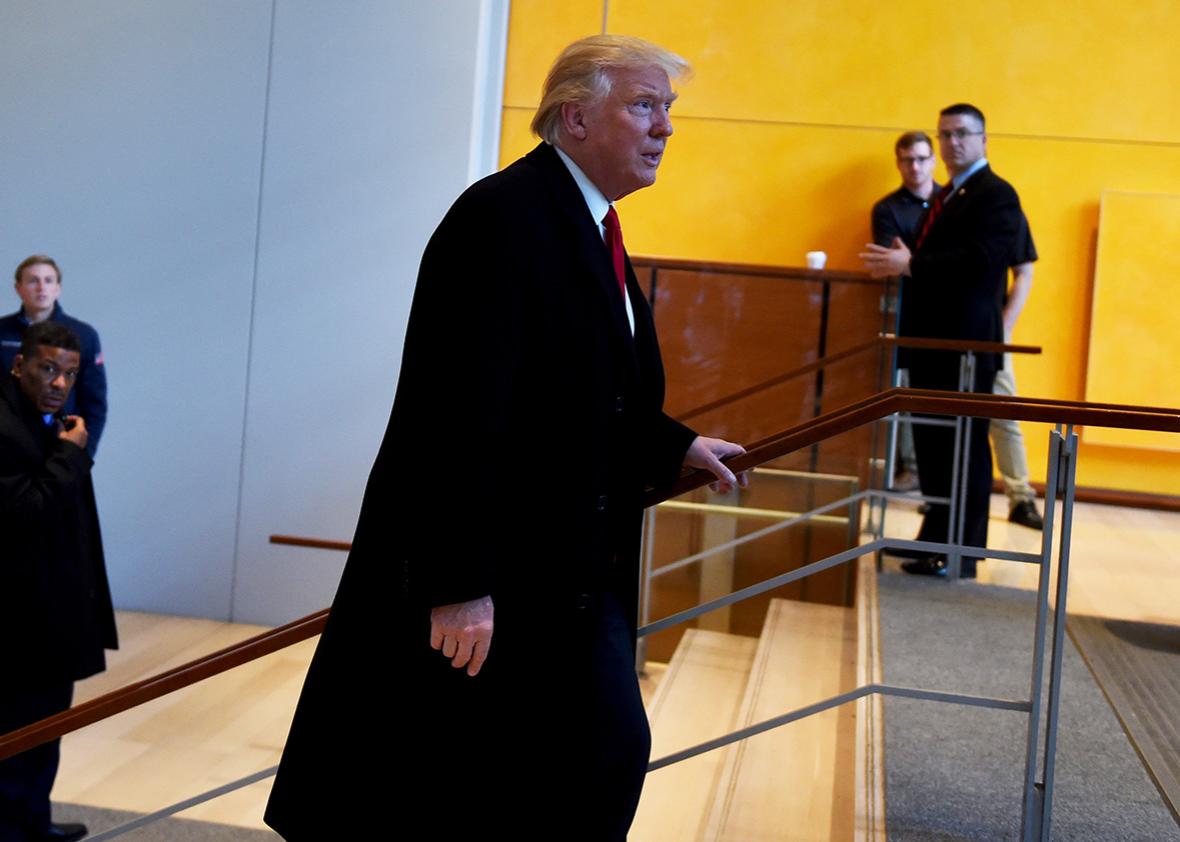 US President-elect Donald Trump leaves after a meeting at the New York Times on November 22, 2016 in New York.