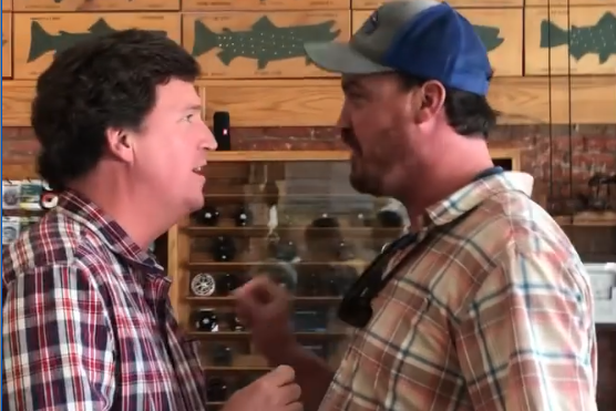 Dan Bailey confronts Tucker Carlson at a story in Livingston, Montana on July 23, 2021.