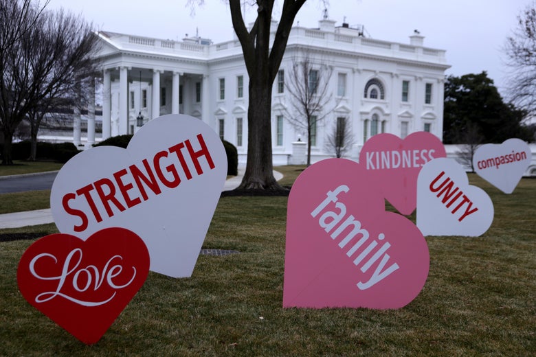 WASHINGTON, DC - FEBRUARY 12: Heart-shape signs with Valentine messages are on display on the North Lawn of the White House February 12, 2021 in Washington, DC. The office of first lady Jill Biden set up the Valentine messages to the country overnight to mark Valentine’s Day. According to a media release, Valentine’s Day has always been one of the favorite holidays of the first lady.  (Photo by Alex Wong/Getty Images)