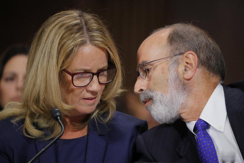 Christine Blasey Ford confers with Michael Bromwich at the hearing.