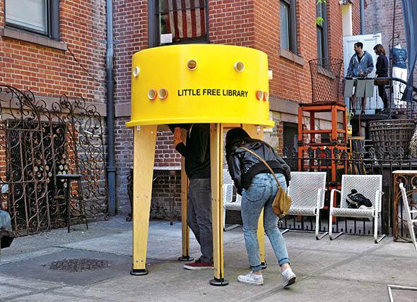 A Little Free Library designed by Stereotank and errected outsid