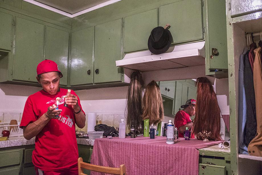 Sex worker Oscar Villareal, 28, in his kitchen in Tijuana, Baja California, Mexico, July 20, 2014. 