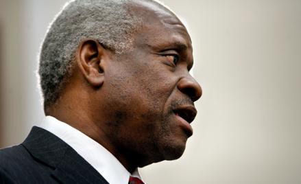 U.S. Supreme Court Justice Clarence Thomas prepares to testify before the House Financial Services and General Government Subcommittee on Capitol Hill March 13, 2008 in Washington, DC.