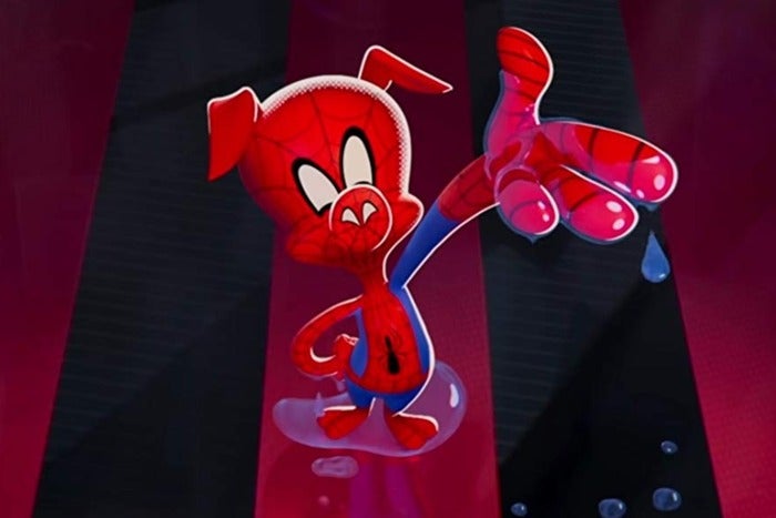 A pig in a Spider-Man suit floating in the air.