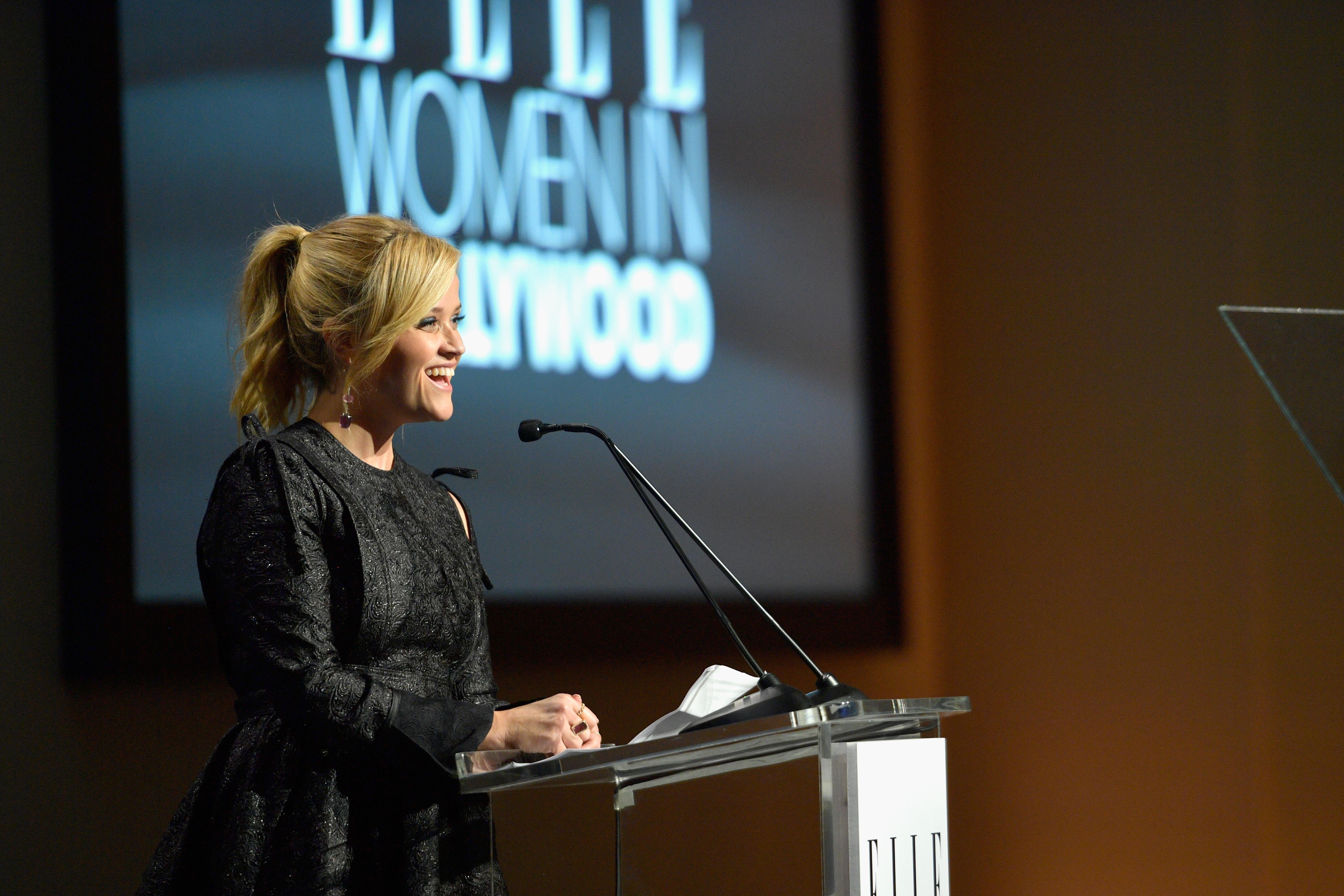 LOS ANGELES, CA - OCTOBER 16:  Reese Witherspoon speaks onstage during ELLE's 24th Annual Women in Hollywood Celebration presented by L'Oreal Paris, Real Is Rare, Real Is A Diamond and CALVIN KLEIN at Four Seasons Hotel Los Angeles at Beverly Hills on October 16, 2017 in Los Angeles, California.  (Photo by Matt Winkelmeyer/Getty Images for ELLE)