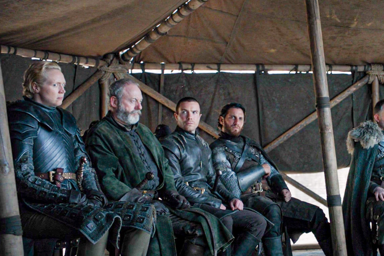 Actors in Game of Thrones' finale with a plastic water bottle visible at their feet.