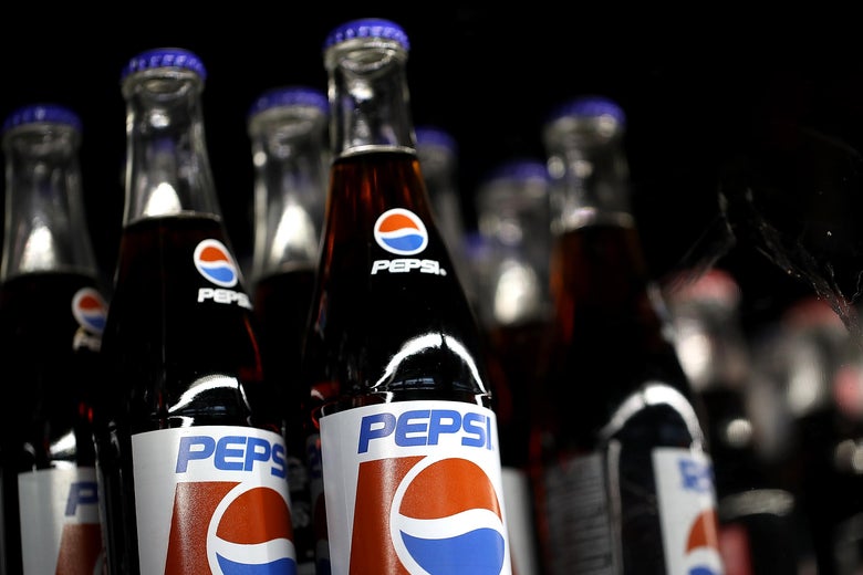 Bottles of Pepsi soda on a shelf