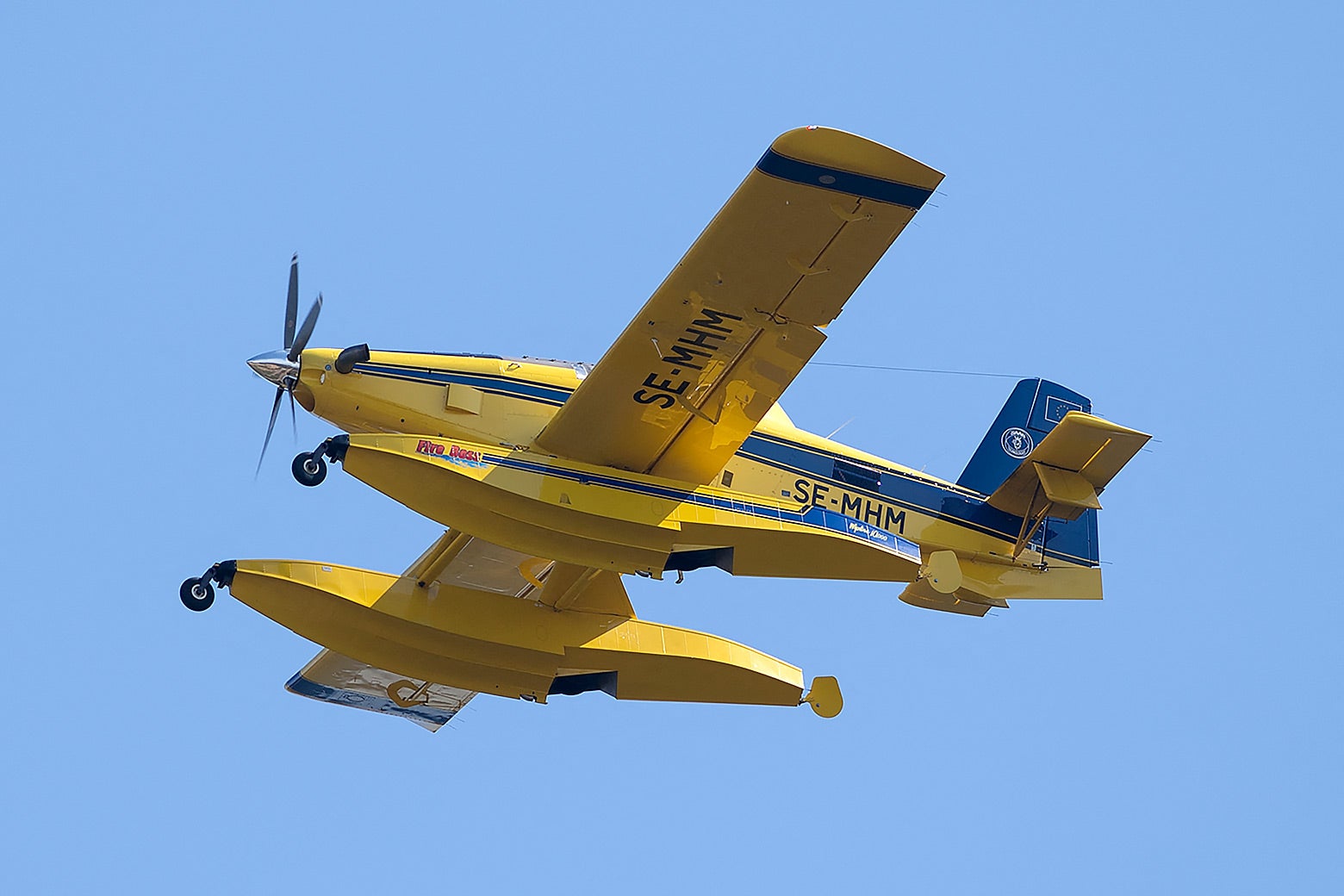 A yellow Air Tractor AT-802 Fire Boss aircraft.