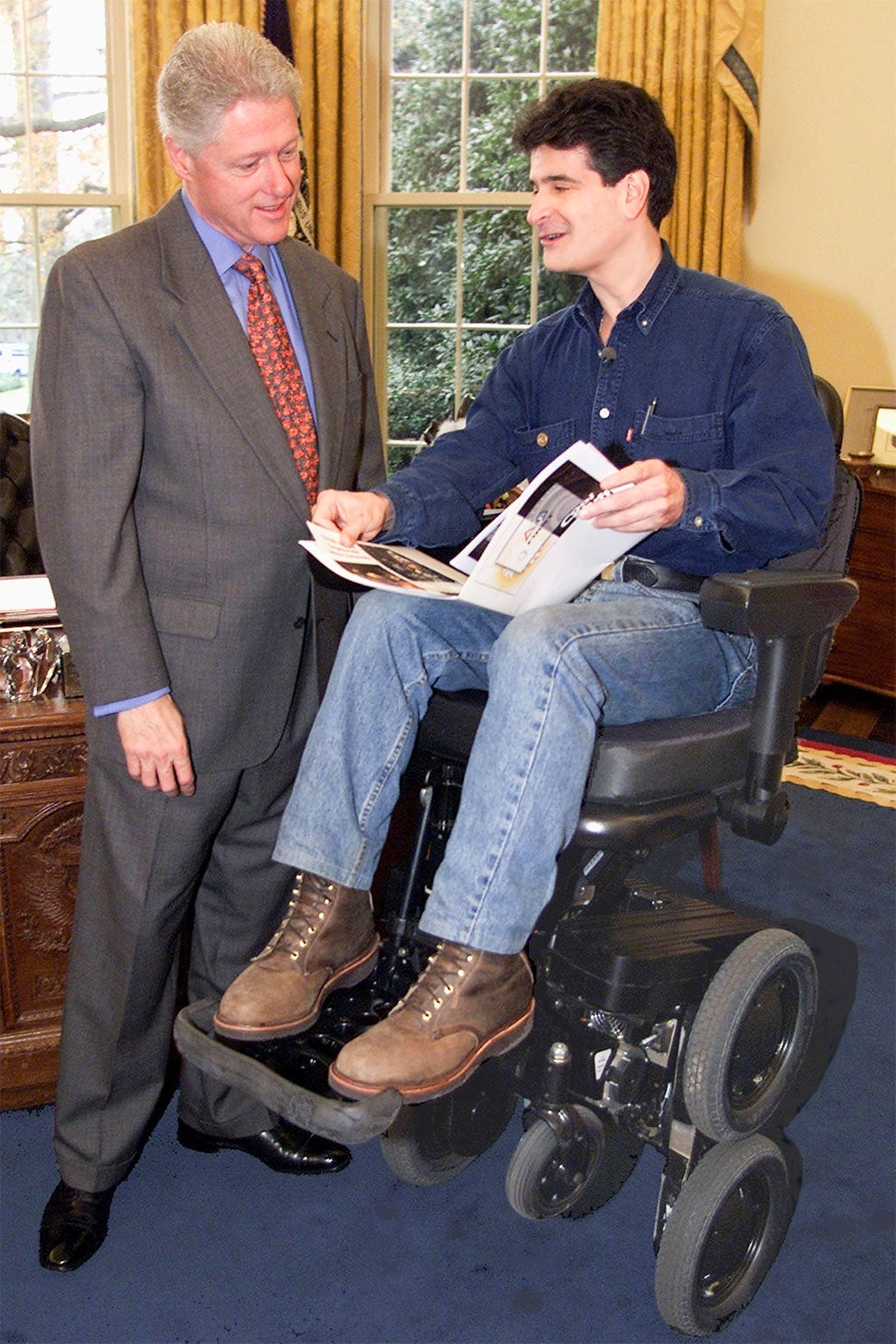 Dean Kamen shows off the iBot, DEKA’s stair-climbing wheelchair, to President Bill Clinton in the White House in 2000. Executive Office of the President of the United States