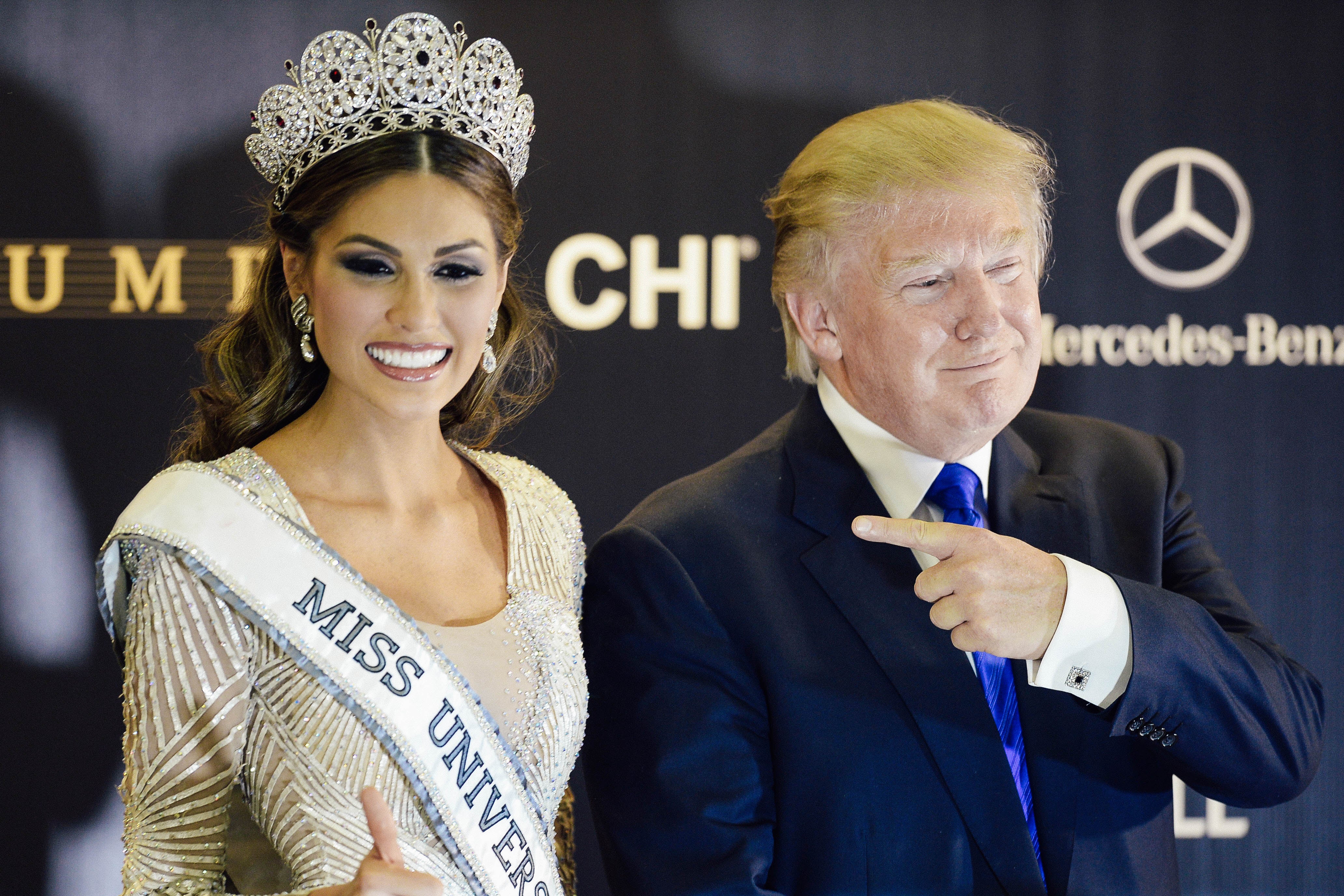 Miss Universe 2013 Gabriela Isler of Venezuela and Donald Trump on Nov. 9, 2013. Trump is wearing a blue or indigo tie in the photo.