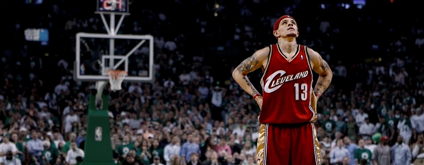 Delonte West stands on the court, looking skyward.