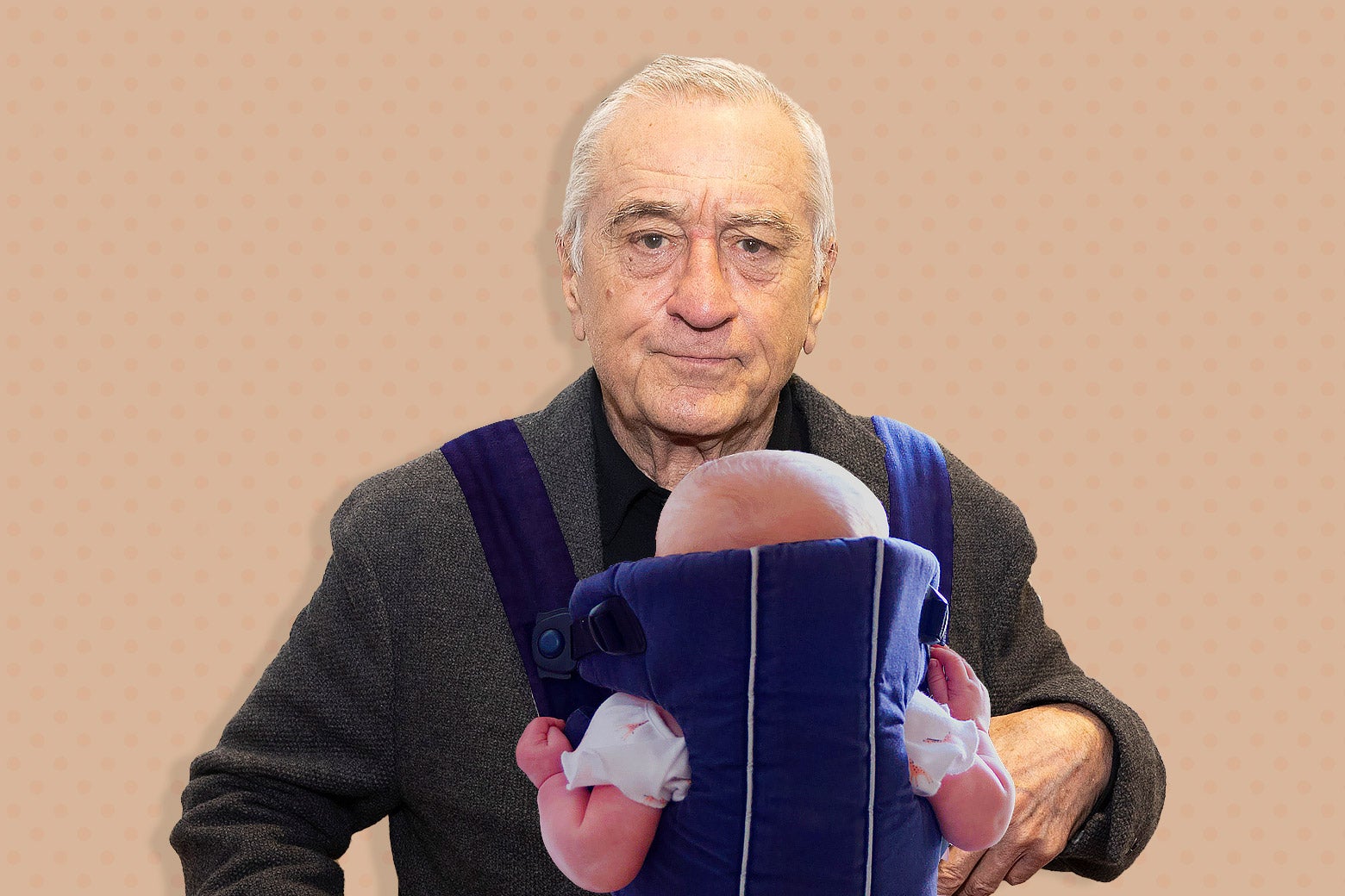 Robert De Niro is a dad, again, at 79. Here he is holding a baby, something he's very used to doing by now.