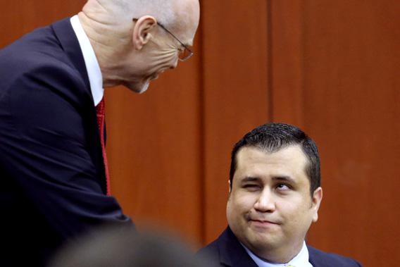 George Zimmerman is greeted by defense counsel Don West at the start of his trial in Seminole circuit court in Sanford, Florida, July  8, 2013.