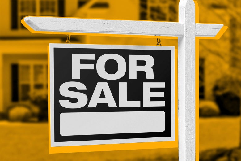 A "for sale" sign in front of a house.