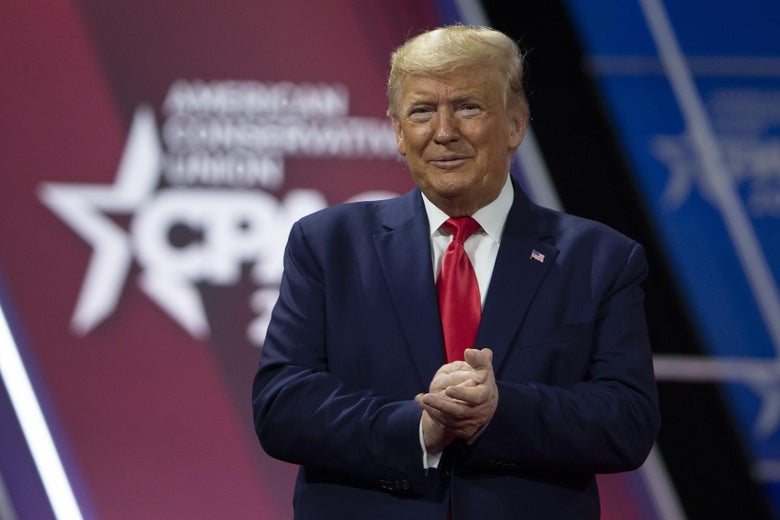 Then-President Donald Trump acknowledges the crowd during the annual Conservative Political Action Conference (CPAC) at Gaylord National Resort & Convention Center February 29, 2020 in National Harbor, Maryland.
