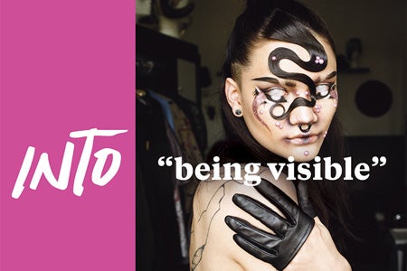 A promo image for Into magazine featuring a person in party makeup