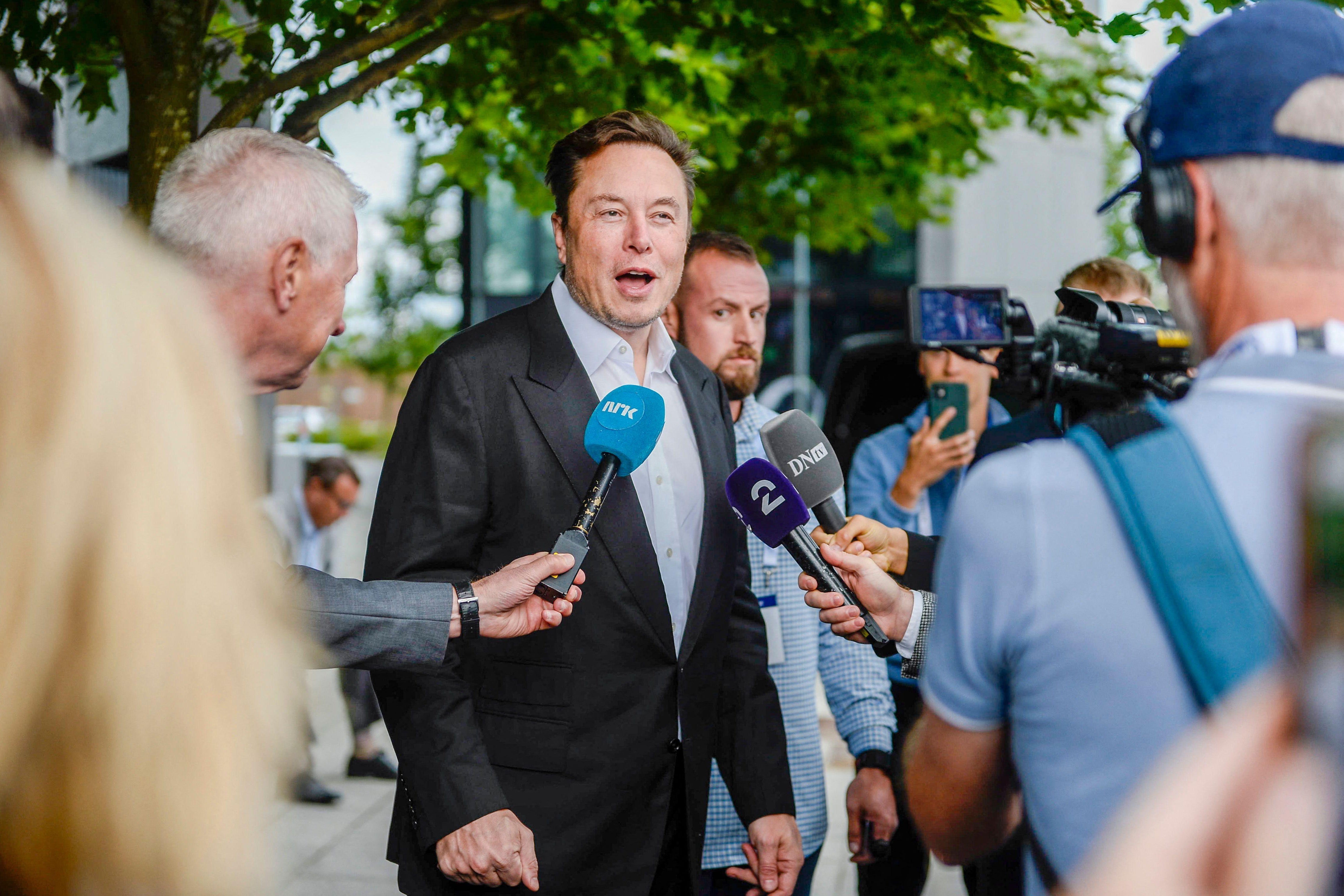 Tesla CEO Elon Musk gives interviews as he arrives at the Offshore Northern Seas 2022 (ONS) meeting in Stavanger, Norway on August 29, 2022. - The meeting, held in Stavanger from August 29 to September 1, 2022, presents the latest developments in Norway and internationally related to the energy, oil and gas sector. - Norway OUT (Photo by Carina Johansen / NTB / AFP) / Norway OUT (Photo by CARINA JOHANSEN/NTB/AFP via Getty Images)