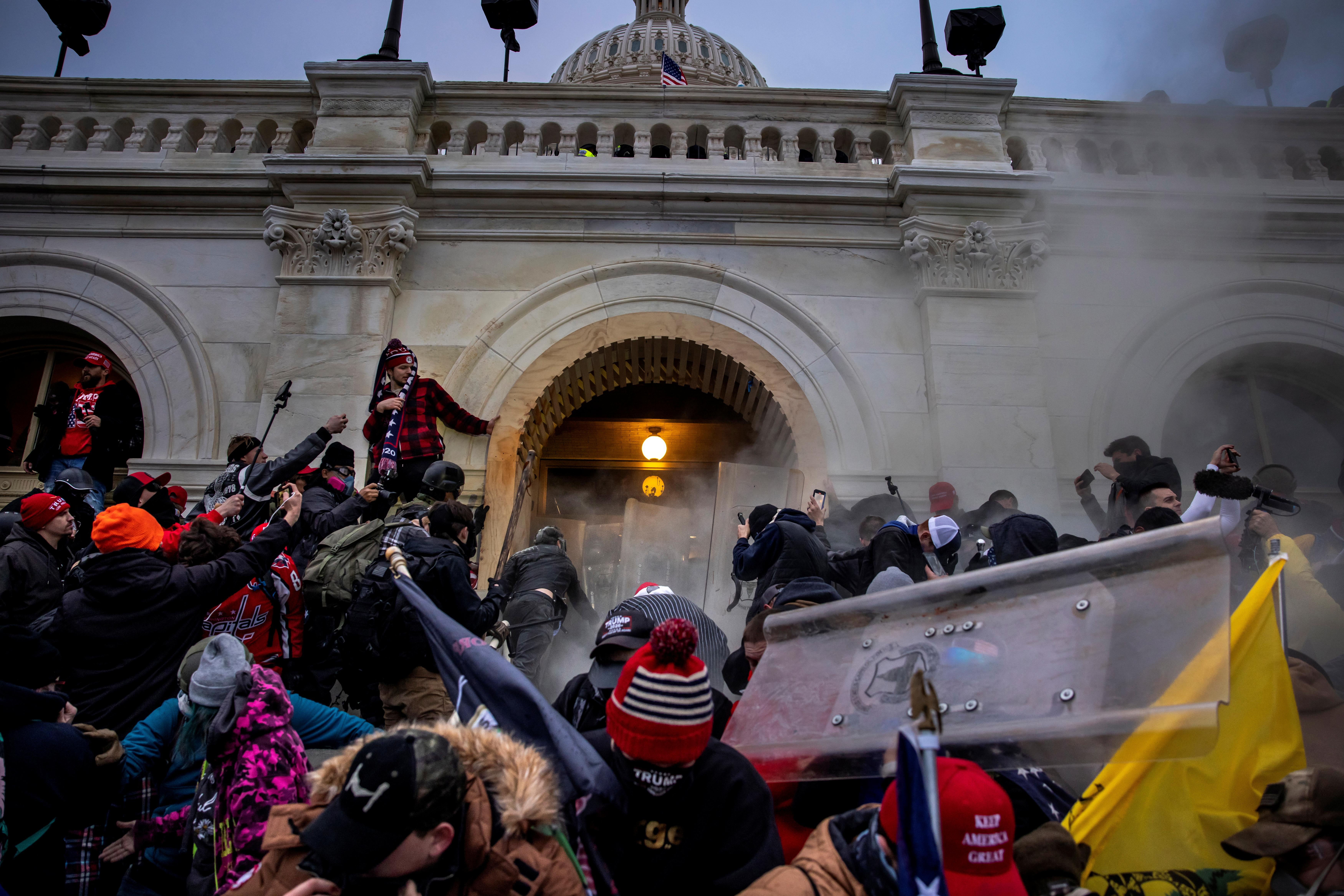 Trump supporters clash with police and security forces as people storm the Capitol on January 6, 2021 in Washington, D.C.