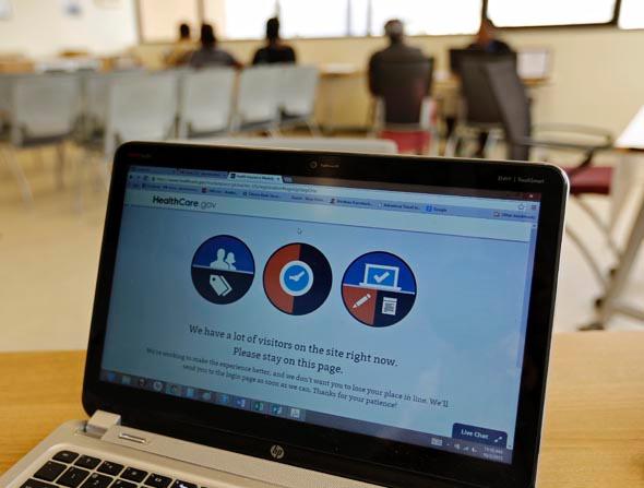 A busy screen is shown on the laptop of a Certified Application Counselor as he attempted to enroll an interested person for Affordable Care Act insurance, known as Obamacare, at the Borinquen Medical Center in Miami, Florida October 2, 2013.