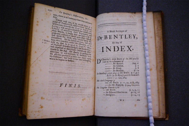 An old, thick book is open to a page reading, "A Short Account of Dr. Bentley by Way of Index."
