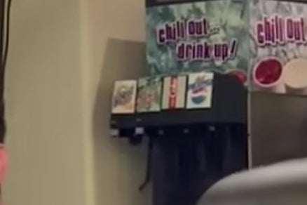 A close-up of the dispensers in Ben Affleck's office, showing one that is clearly Diet Coke and one that is clearly Diet Pepsi.