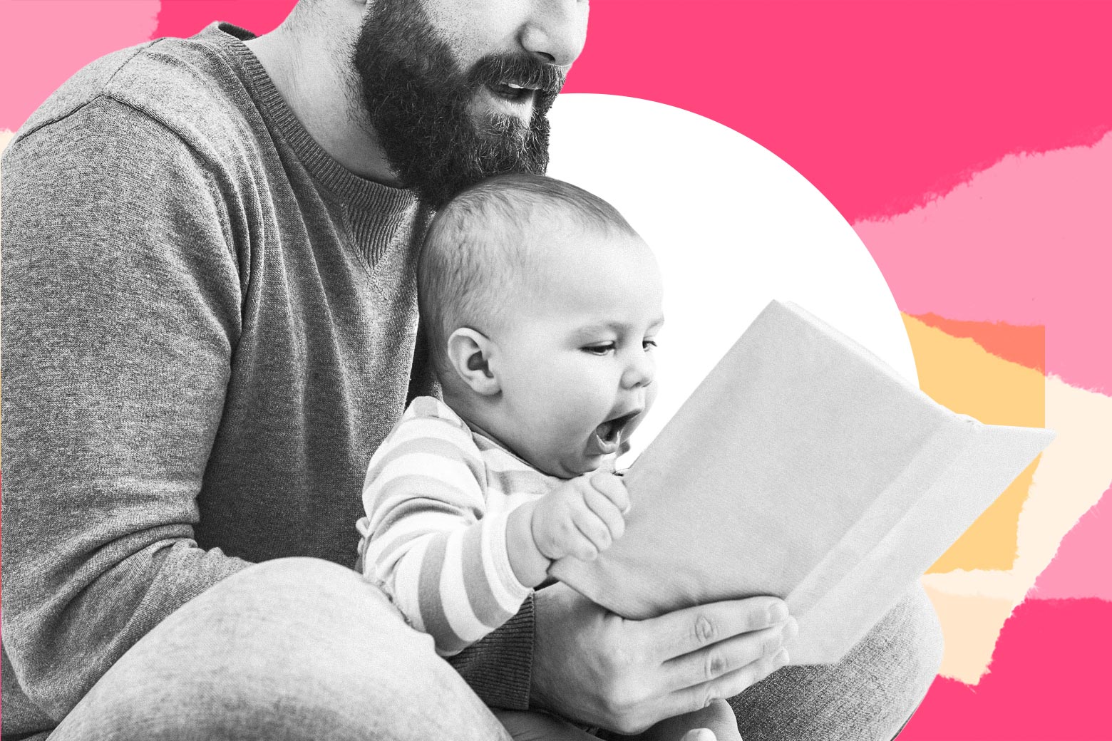 A father holds his baby in his lap and reads a book.