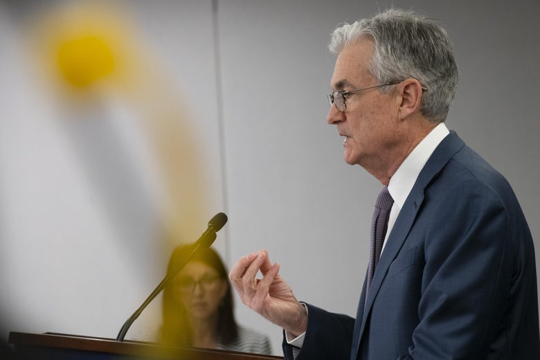 Jerome Powell speaks at a podium.