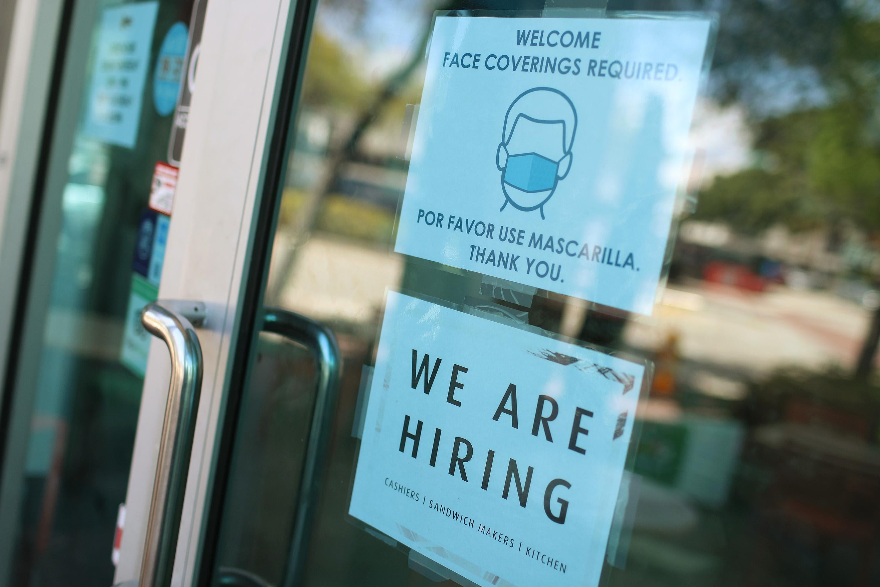 MIAMI, FLORIDA - MARCH 05: A 'we are hiring' sign in front of a store on March 05, 2021 in Miami, Florida. The restaurant is looking to hire more workers as the U.S. unemployment rate drops to 6.2 percent, as many restaurants and bars reopen. Officials credit the job growth to declining new COVID-19 cases and broadening vaccine immunization that has helped more businesses reopen with greater capacity. (Photo by Joe Raedle/Getty Images)