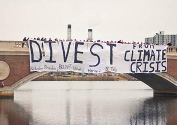 Divest Harvard student action in December 2013, Cambridge, Mass. 