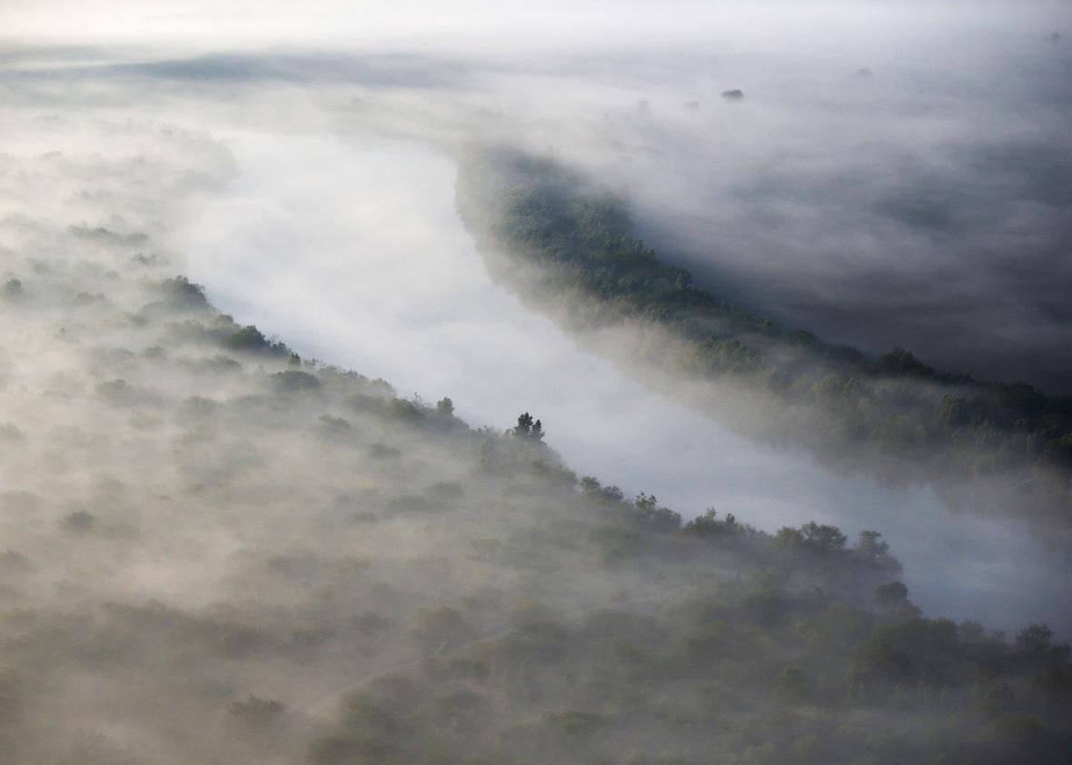 A fog slowly lifts over the Rio Grande which forms the U.S.-Mexico border on December 10, 2015 near La Grulla, Texas. 