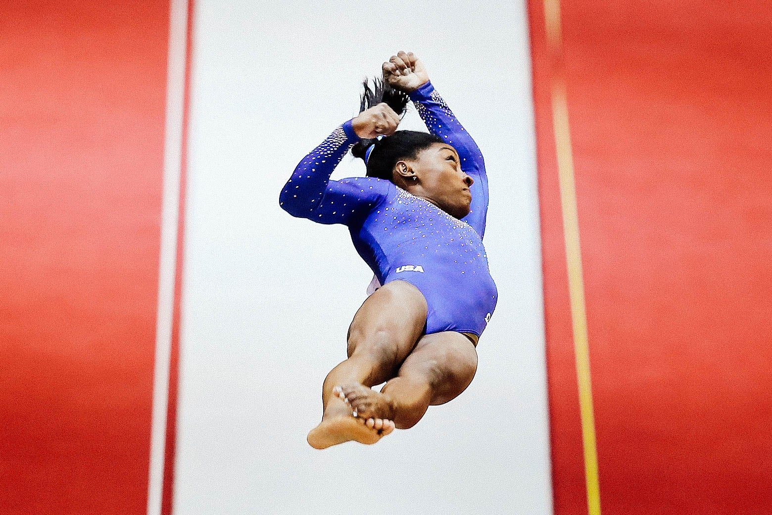 Simone Biles, mid-vault. The angle of the image makes it unclear as to whether it was the Biles.