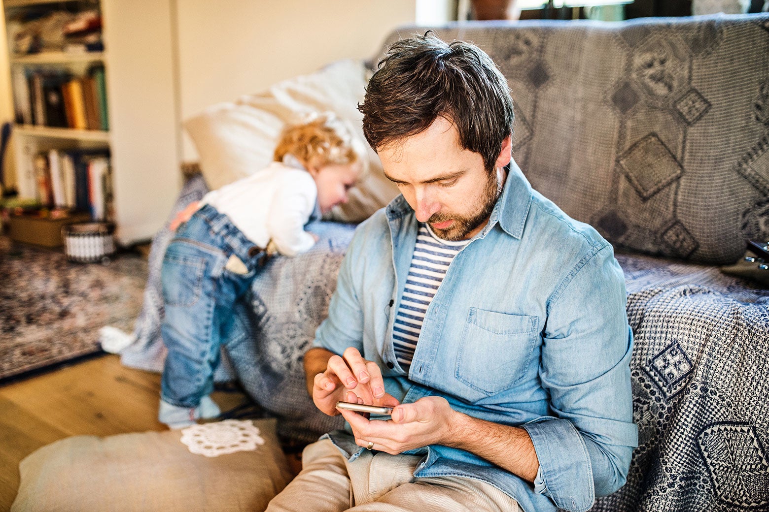 Looking at the phone while parenting: Why toddler parents try, and fail, to concentrate on their kids.