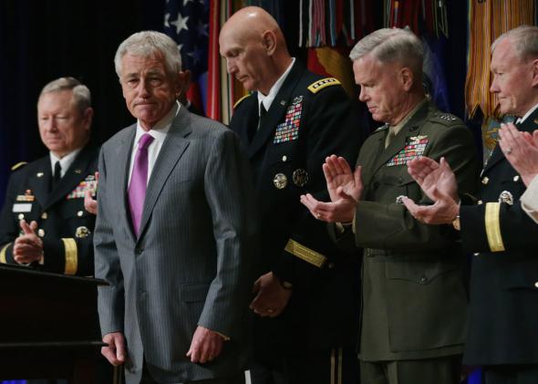 Defense Secretary Chuck Hagel recieves applause after signing the Department of Defense Human Goals Charter on April 28, 2014.
