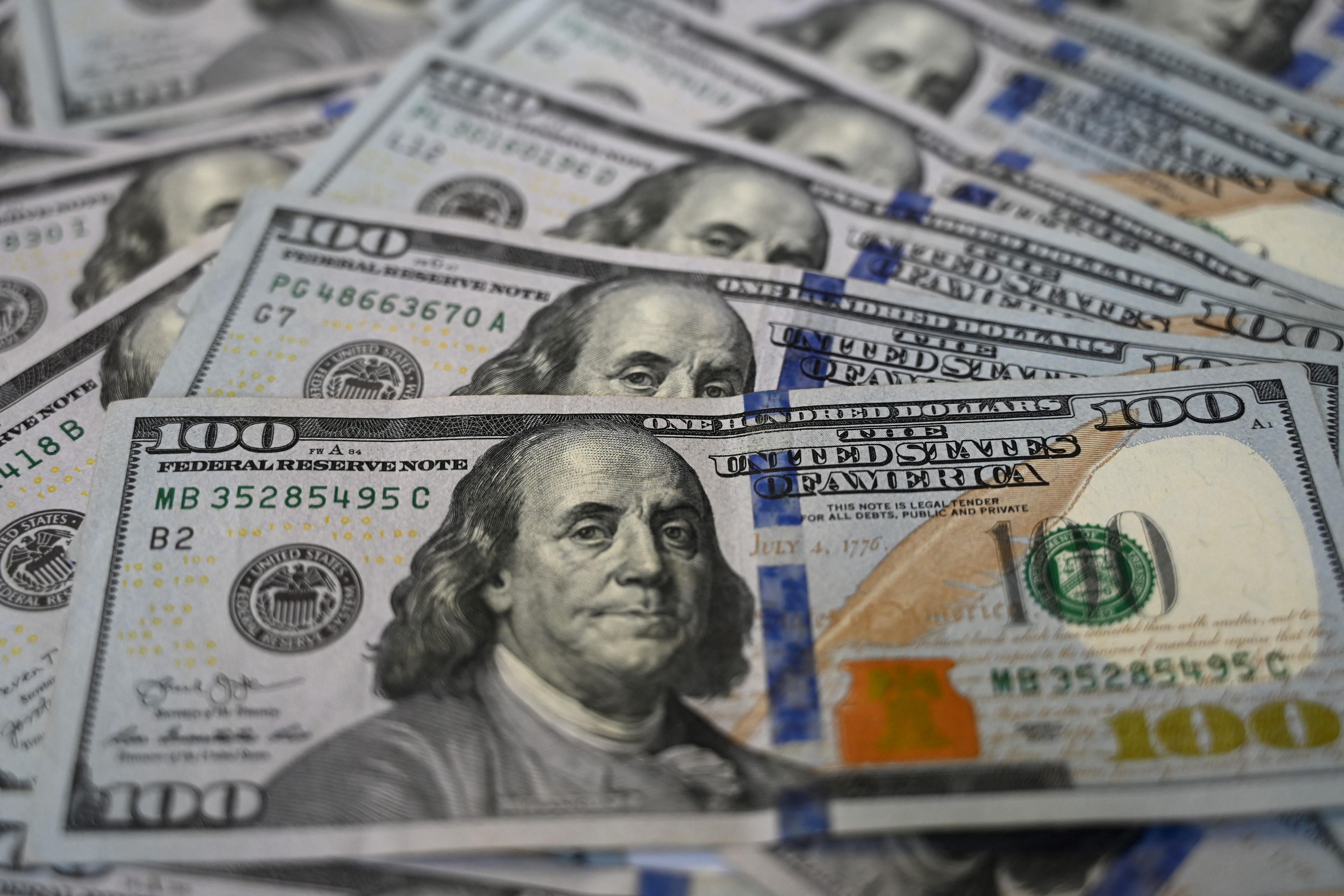 A pile of U.S. $100 bills