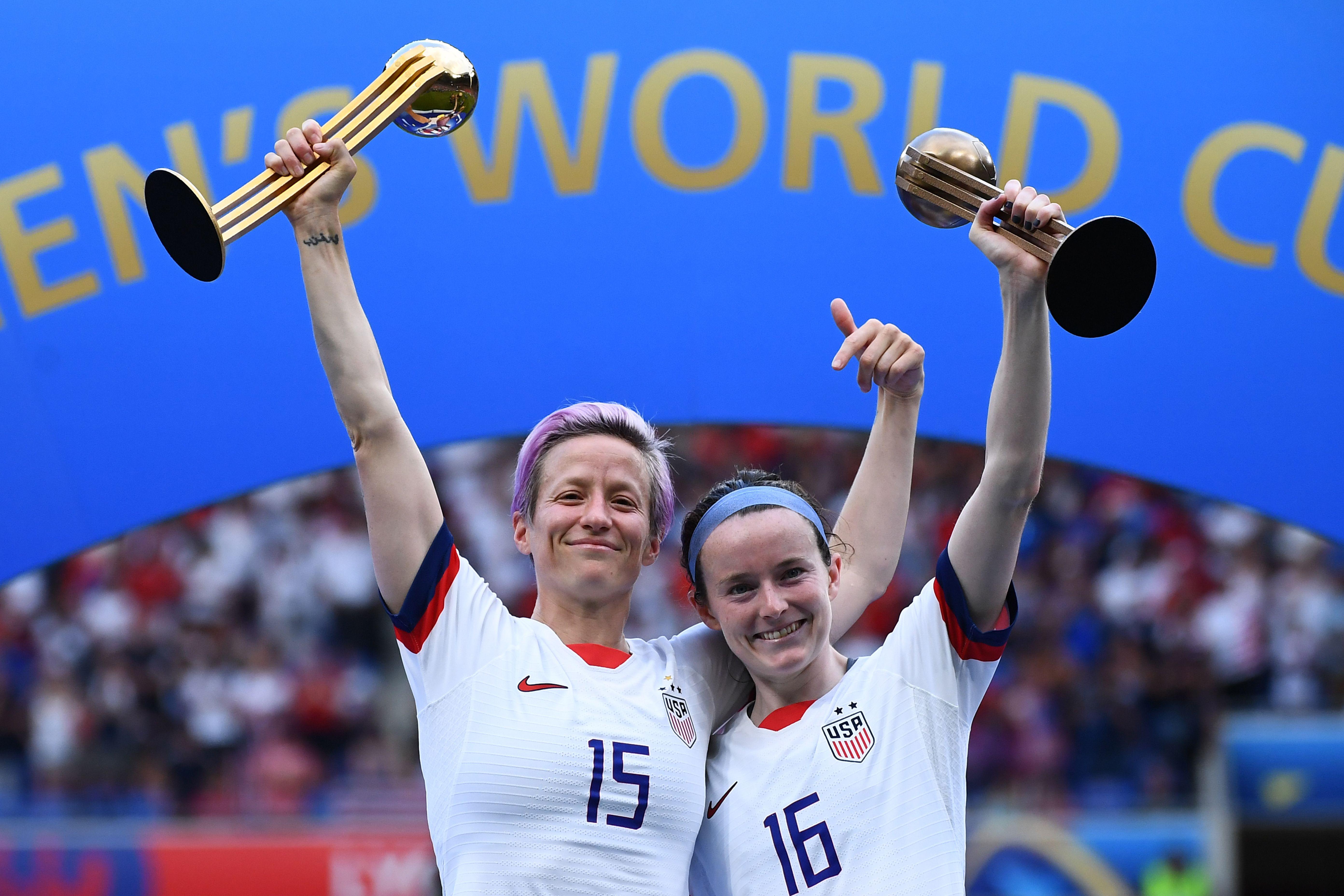 Megan Rapinoe poses with the Golden Ball next to Rose Lavelle with the Silver Ball after the U.S. won the Women's World Cup. 