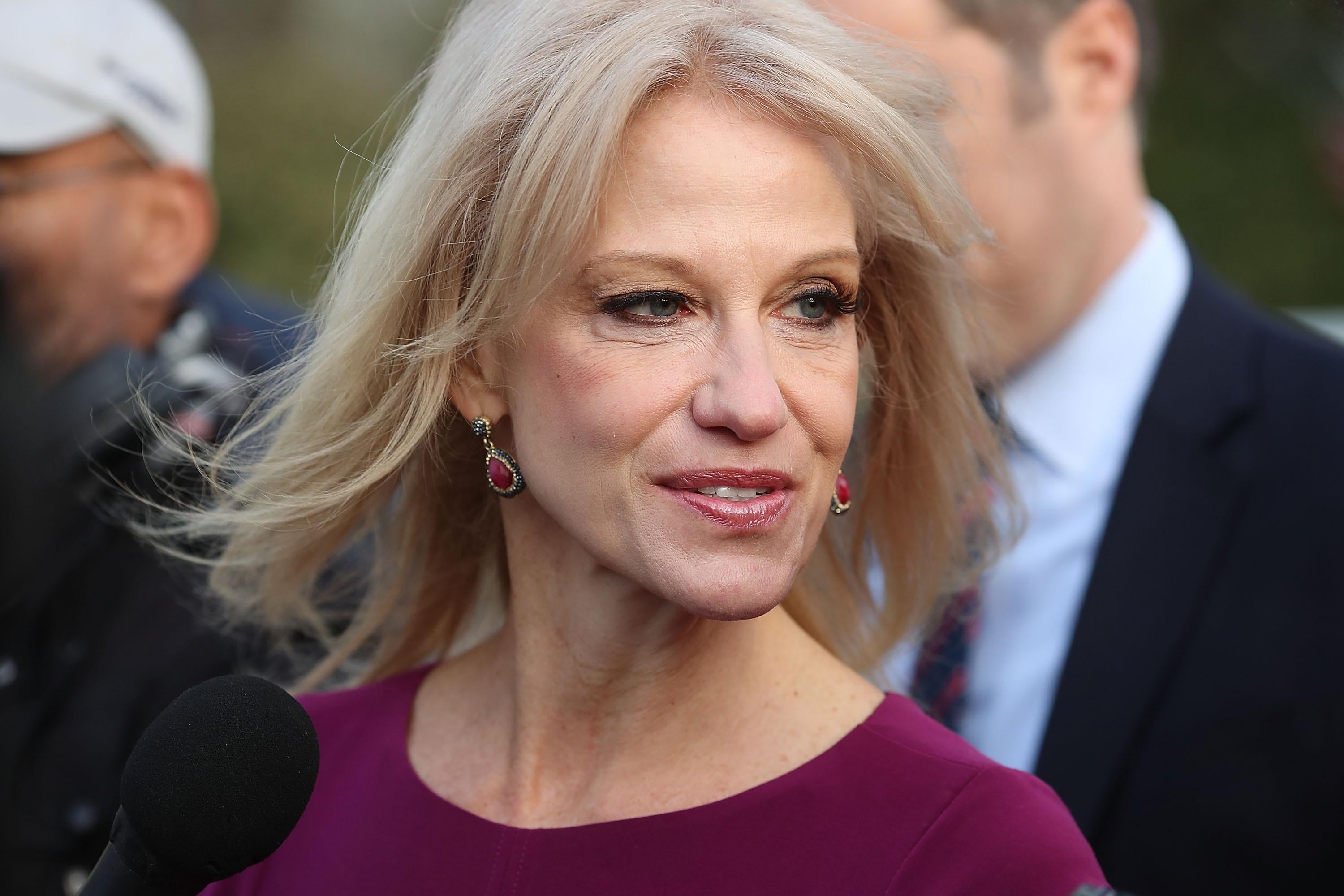 White House counselor Kellyanne Conway speaks to reporters on the White House driveway after doing a television interview, on April 13, 2018 in Washington, D.C.