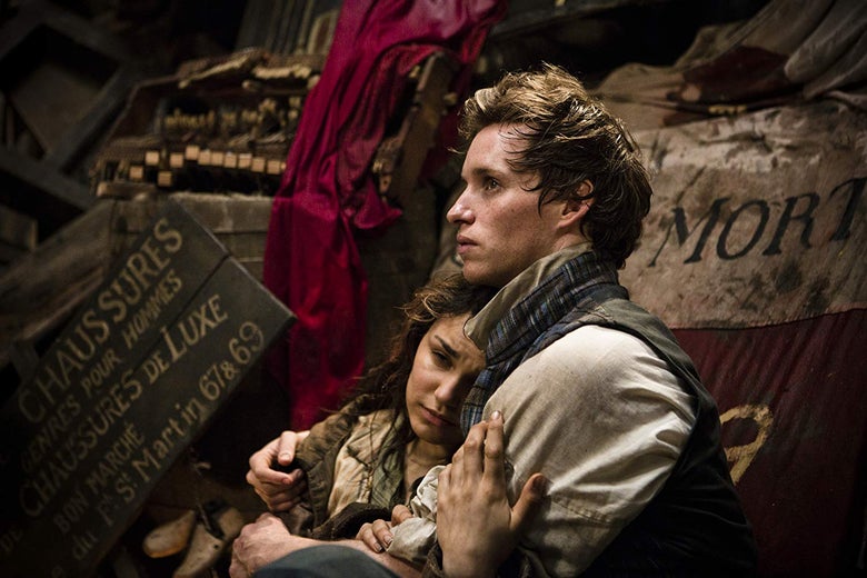 Samantha Barks leans on Eddie Redmayne.
