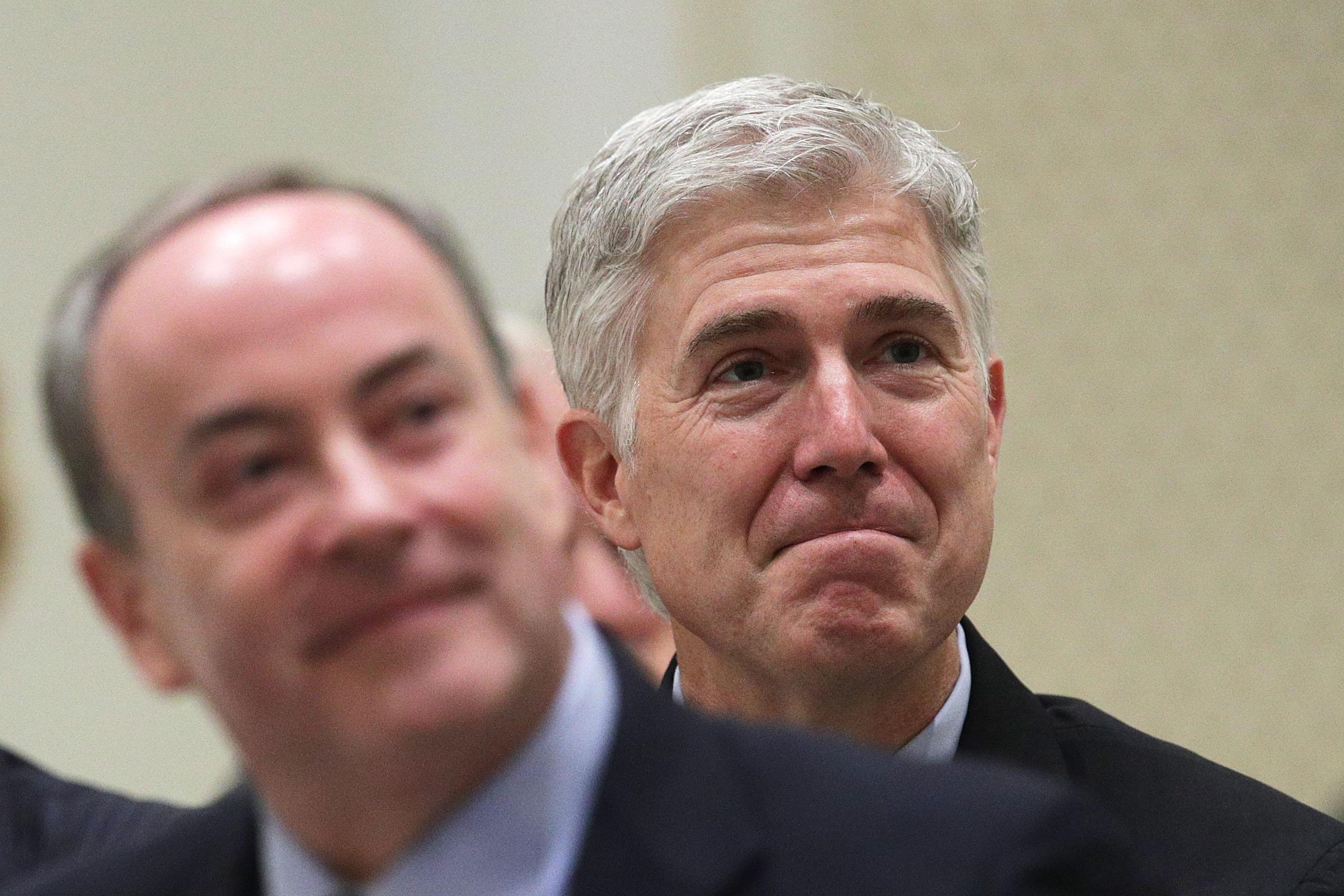 WASHINGTON, DC - SEPTEMBER 28:  U.S. Supreme Court Justice Neal Gorsuch (R) and Clint Bolick (L), associate justice of the Arizona Supreme Court listen during an event hosted by The Fund for American Studies September 28, 2017 at Trump International Hotel in Washington, DC. Justice Gorsuch gave keynote speech at the event that celebrate the 50th anniversary of the organization.  (Photo by Alex Wong/Getty Images)