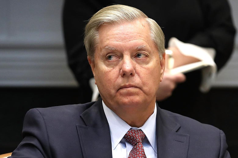 Sen. Lindsey Graham (R-SC) attends a meeting with U.S. President Donald Trump and Republican members of Congress in the Roosevelt Room of the White House December 5, 2017 in Washington, DC. 