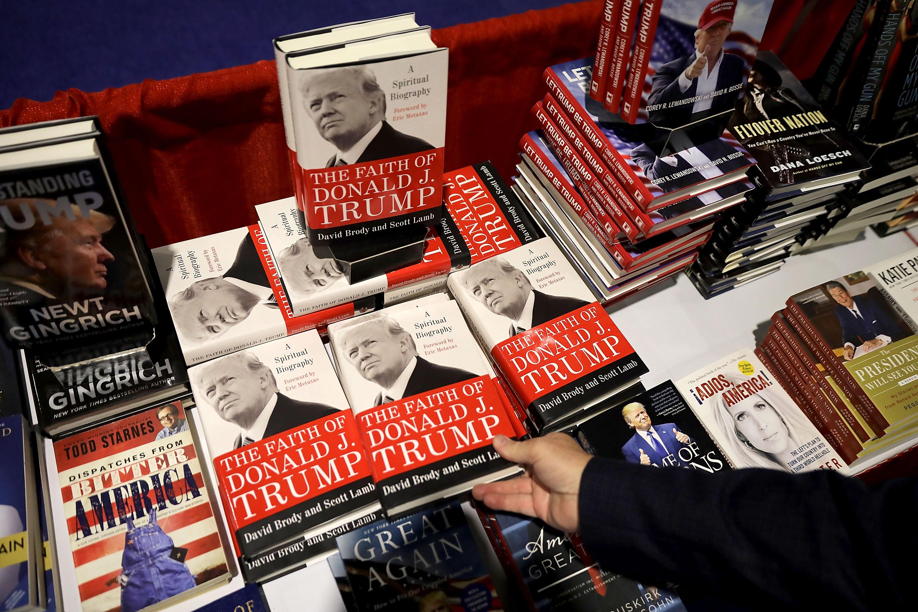 NATIONAL HARBOR, MD - FEBRUARY 23:  Books about Donald Trump and other right wing subjects are for sale inside the Conservative Political Action Conference Hub at the Gaylord National Resort and Convention Center February 23, 2018 in National Harbor, Maryland. Earlier in the day U.S. President Donald Trump addressed CPAC, the largest annual gathering of conservatives in the nation.  (Photo by Chip Somodevilla/Getty Images)