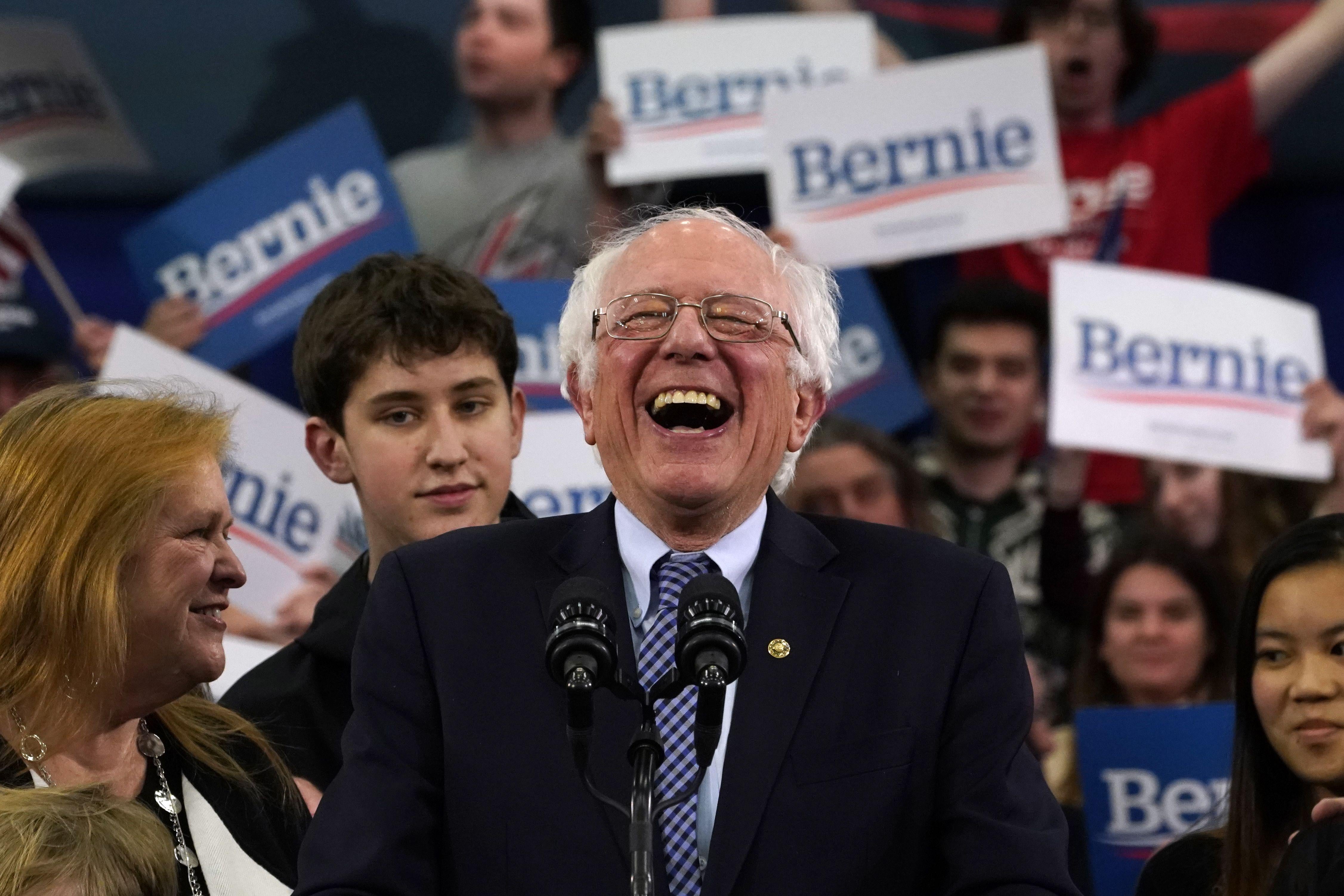 Bernie Sanders laughs uproariously.