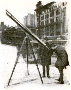 On 42nd street in New York, Joseph G. White shows the new comet or the planets through his 4 1/2 inch refracting telescope, March 1921.