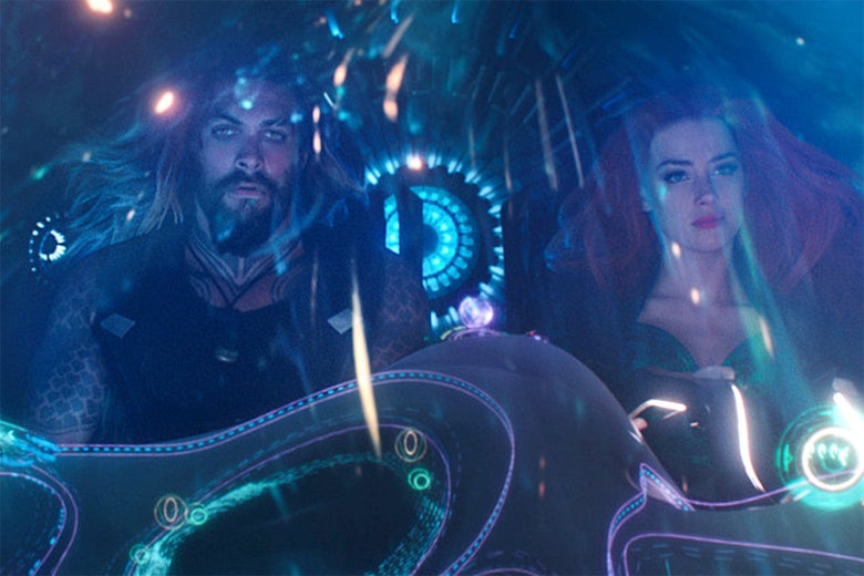 Aquaman and Mera in a ship underwater.