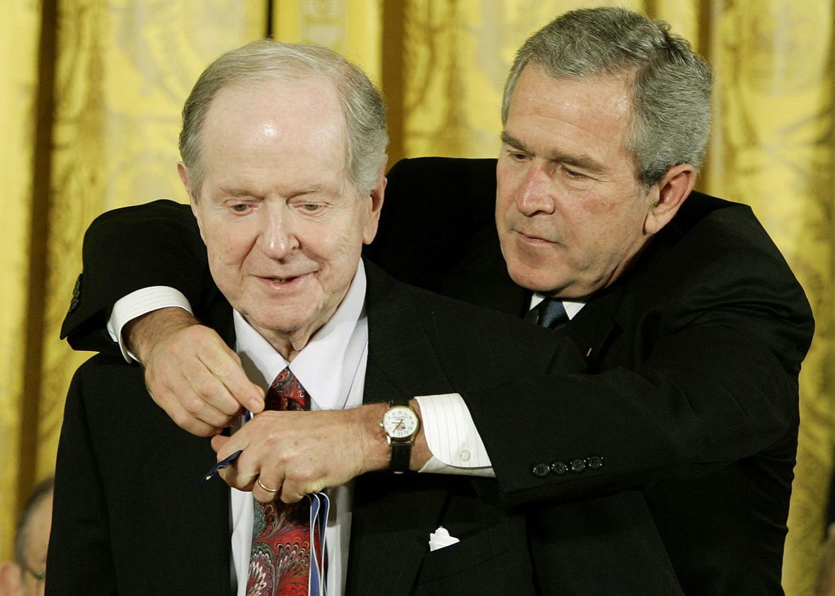 Historian Robert Conquest receives the Presidential Medal of Freedom from President George W. Bush at the White House on Nov. 9, 2005.