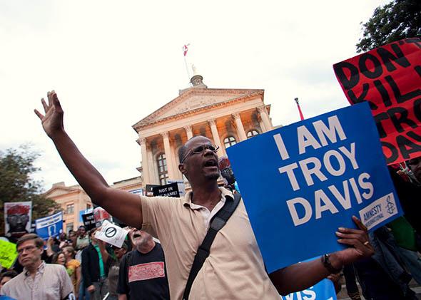 Michael Henry and other protesters for Troy Davis gather on the steps of the Georgia State Capitol in Atlanta on Sept. 20, 2011, the day before Davis’ execution
