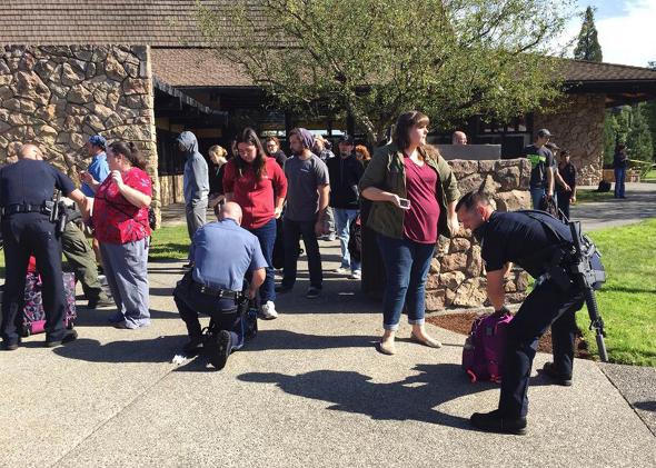 Bag inspection at scene of Shooting Umpqua Community College Ore,Bag inspection at scene of Shooting Umpqua Community College Oregon